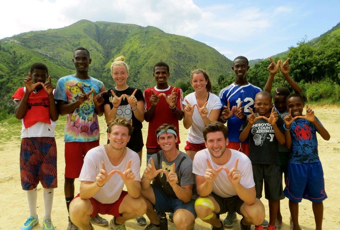 Jake Bunz and Badgers teammates in Haiti
